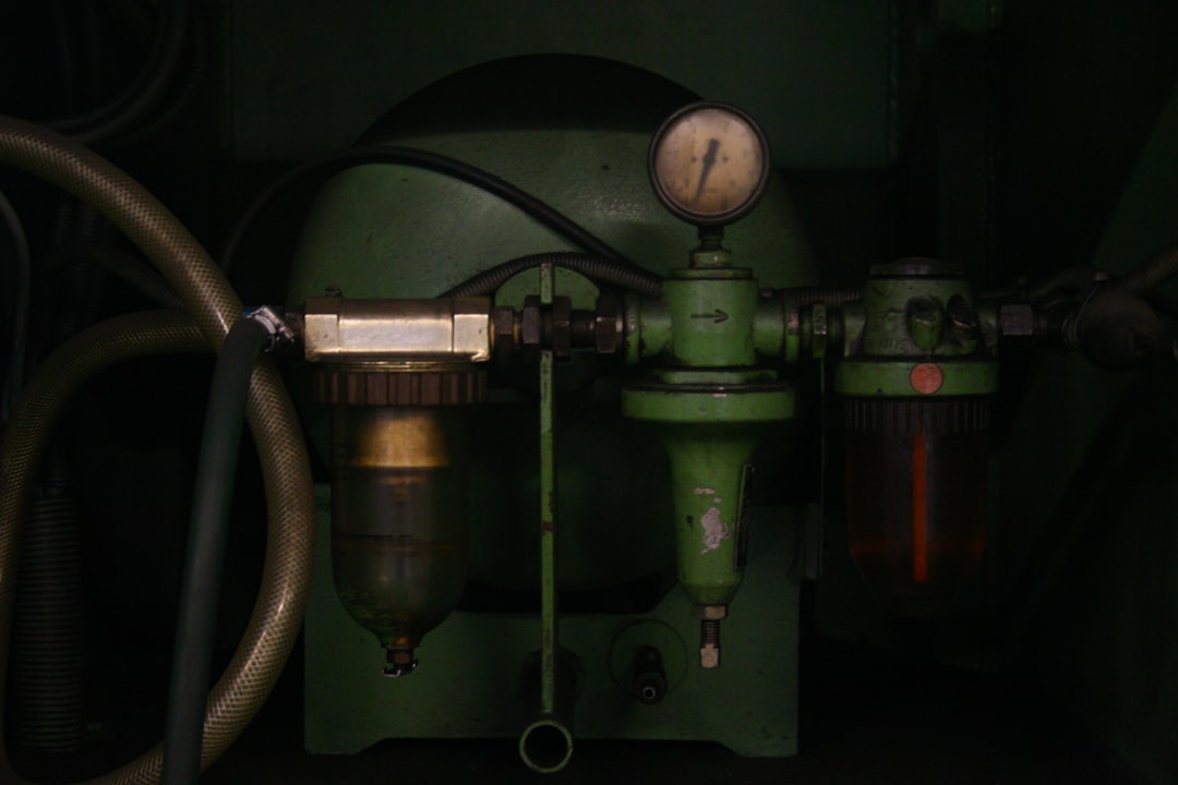 Close-up of industrial machinery with gauges and filters.
