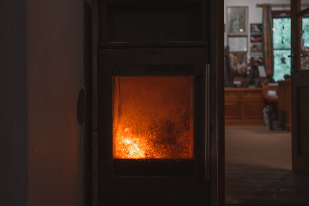 A fire burning in a fireplace in a living room