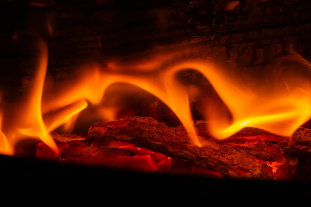 A close up of a fire burning in a fireplace
