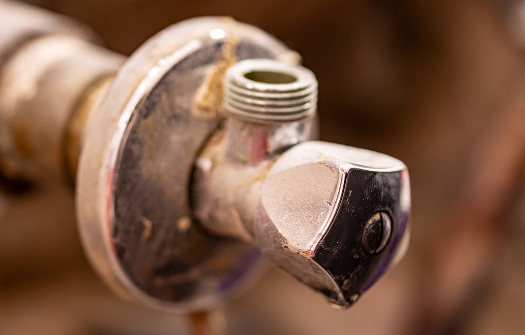 A close up of a water faucet with nozzles
