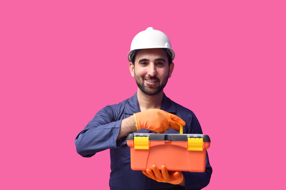 a person holding a drill