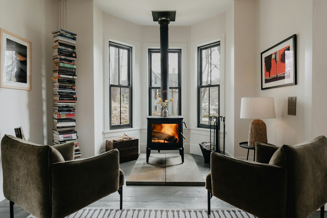 a living room filled with furniture and a fire place